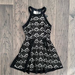 New back and beige lace dress